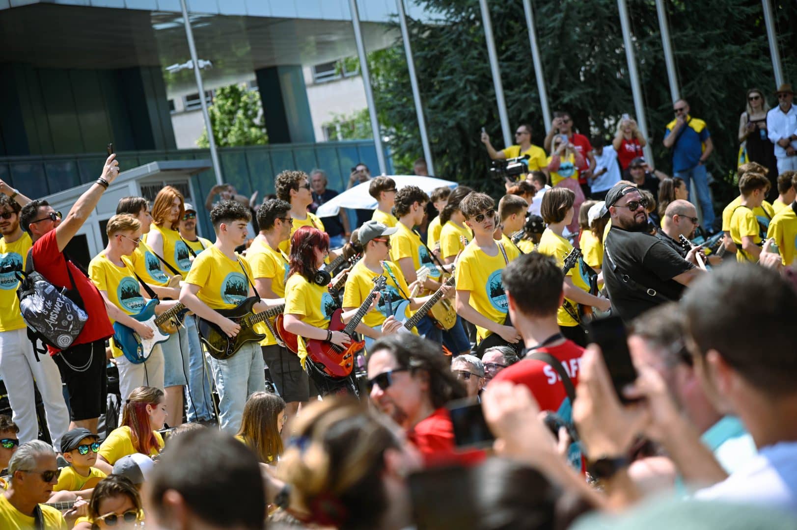Young guitarists, singers and drummers performing on stage at Sarajevo Rocks 2026, celebrating Sarajevo's rich rock music heritage.
